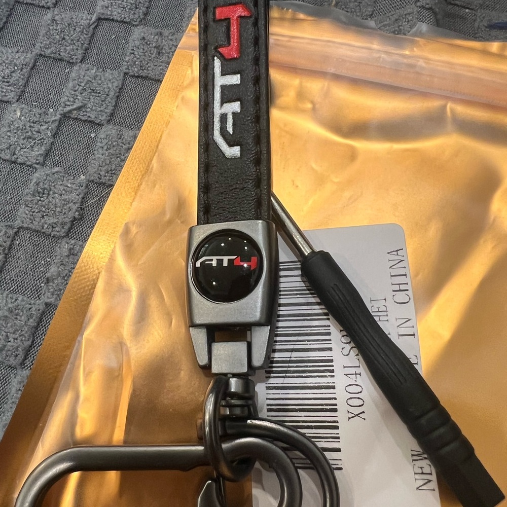 AT4 Black Leather Keychain Accessory